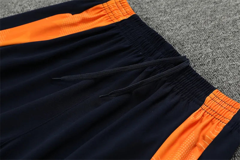 24-25 Real Madrid Light Blue and Orange Training Suit