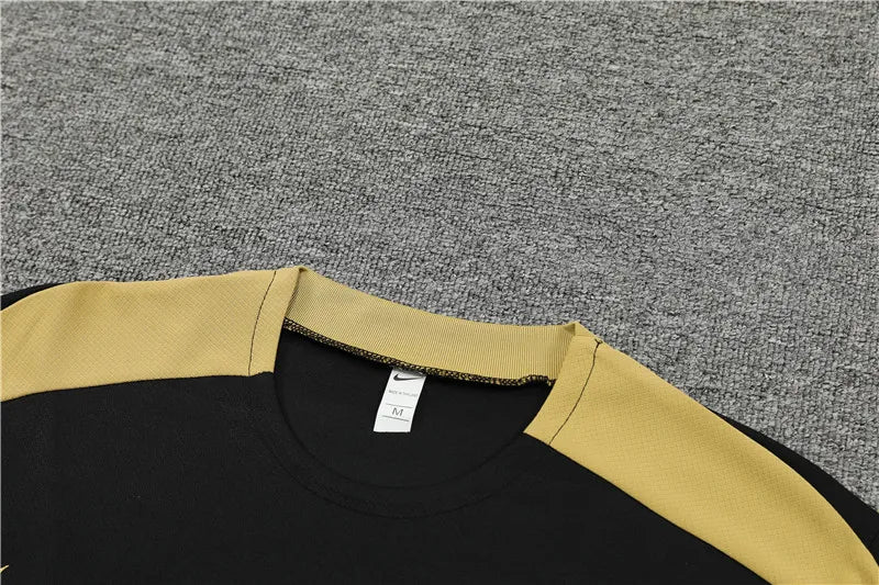24-25 PSG Black and Gold Short Sleeve Training Suit