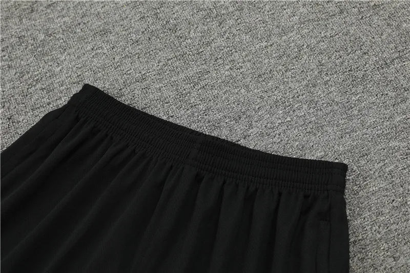24-25 PSG Black and Gold Short Sleeve Training Suit